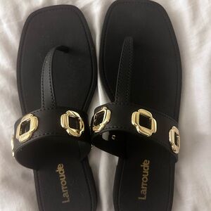 Larroude Jelly Black Sandals with Gold Buckles